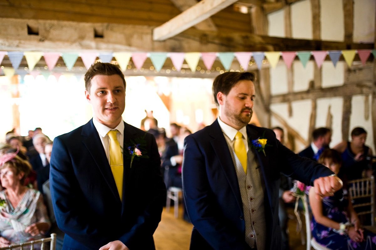 Bride Alice wore a chic, Charlie Brear column style gown for her 1920's and books/literary inspired summer barn wedding. Images by Richard Beaumont.