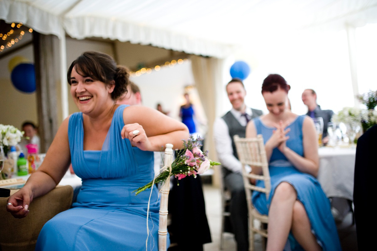 Bride Alice wore a chic, Charlie Brear column style gown for her 1920's and books/literary inspired summer barn wedding. Images by Richard Beaumont.