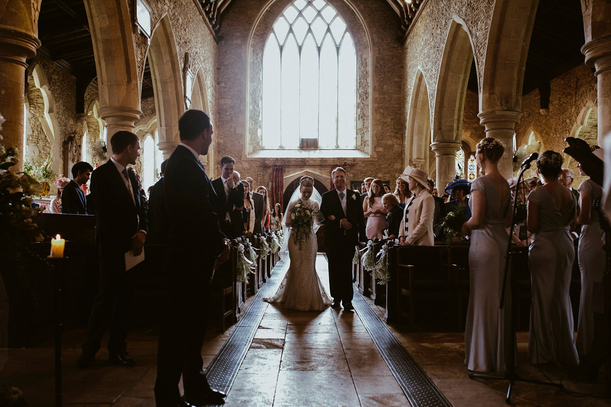 An elegant halterneck dress and bridesmaids in pale blue for a stylish English country wedding. Captured by Ruth Atkins Photography. An elegant halterneck dress and bridesmaids in pale blue for a stylish English country wedding. Captured by Ruth Atkins Photography.