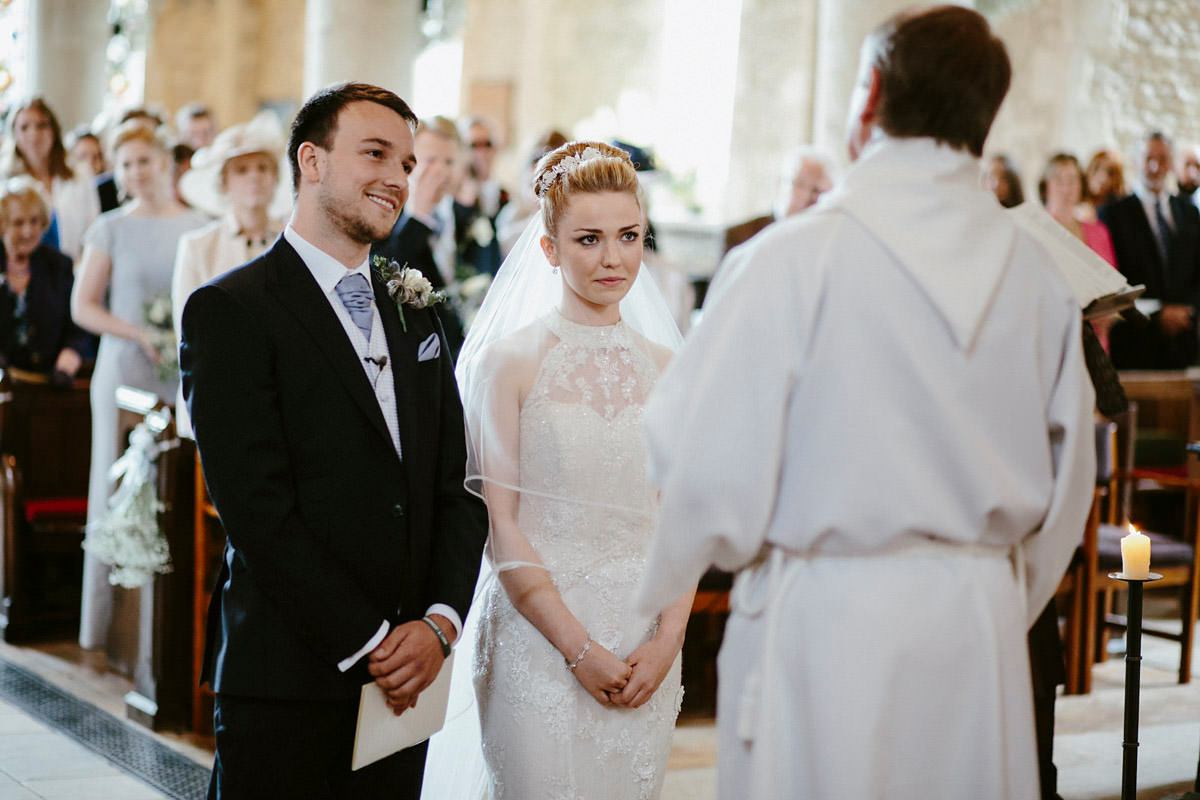 An elegant halterneck dress and bridesmaids in pale blue for a stylish English country wedding. Captured by Ruth Atkins Photography. An elegant halterneck dress and bridesmaids in pale blue for a stylish English country wedding. Captured by Ruth Atkins Photography.