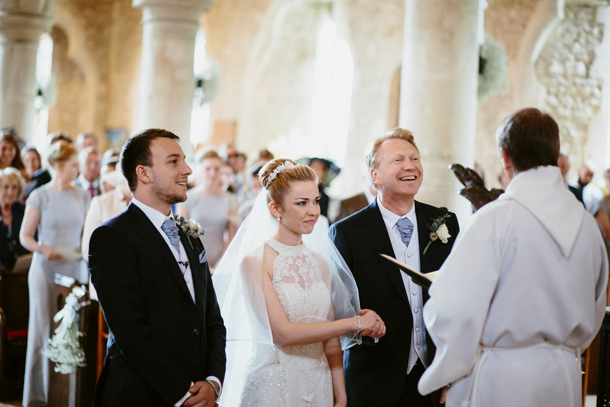 An elegant halterneck dress and bridesmaids in pale blue for a stylish English country wedding. Captured by Ruth Atkins Photography. An elegant halterneck dress and bridesmaids in pale blue for a stylish English country wedding. Captured by Ruth Atkins Photography.