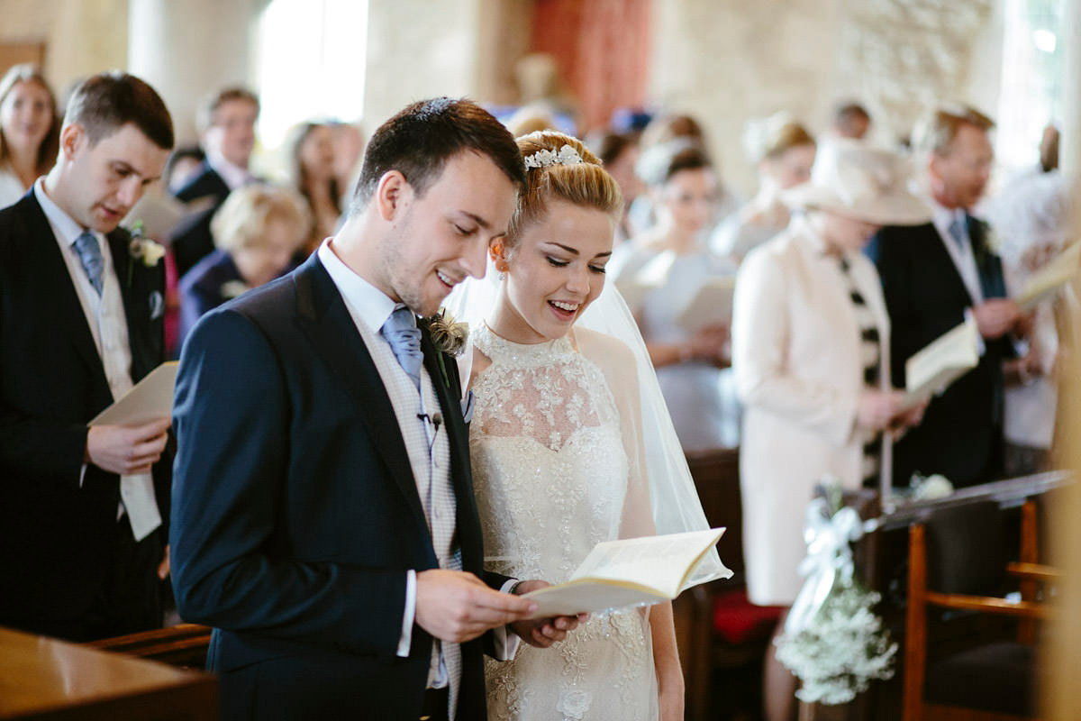 An elegant halterneck dress and bridesmaids in pale blue for a stylish English country wedding. Captured by Ruth Atkins Photography. An elegant halterneck dress and bridesmaids in pale blue for a stylish English country wedding. Captured by Ruth Atkins Photography.