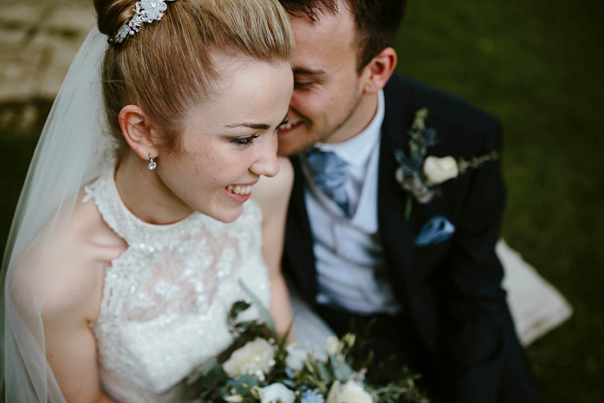 An elegant halterneck dress and bridesmaids in pale blue for a stylish English country wedding. Captured by Ruth Atkins Photography. An elegant halterneck dress and bridesmaids in pale blue for a stylish English country wedding. Captured by Ruth Atkins Photography.