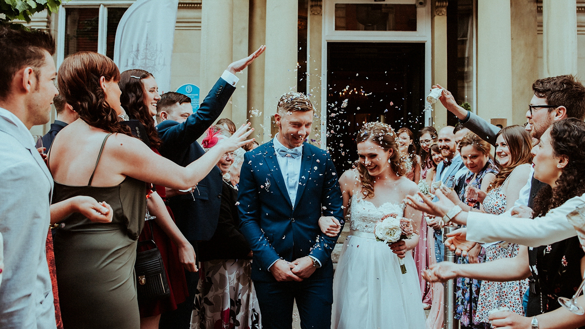 Bride Amy wore a Grace Loves Lace gown for her chic, city wedding in Leeds. Photography by Shutter Go Click.