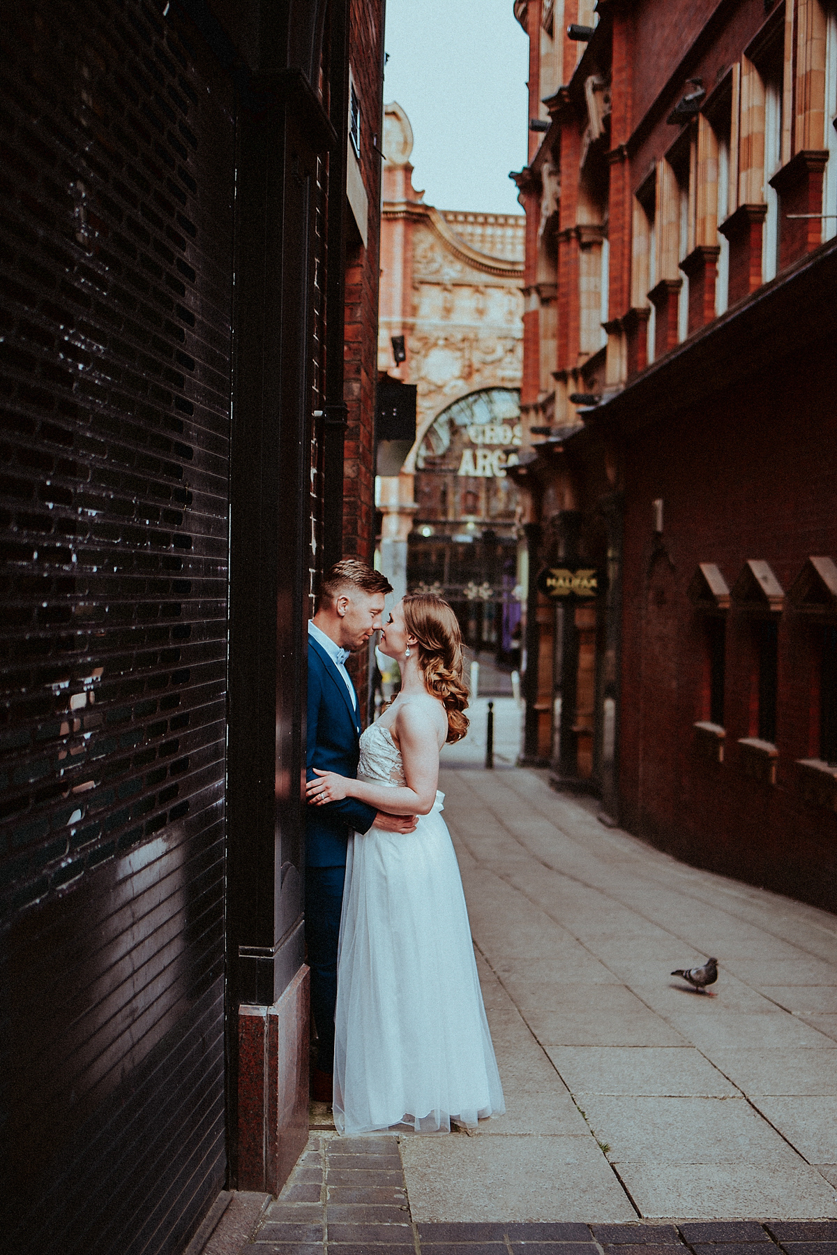 Bride Amy wore a Grace Loves Lace gown for her chic, city wedding in Leeds. Photography by Shutter Go Click.