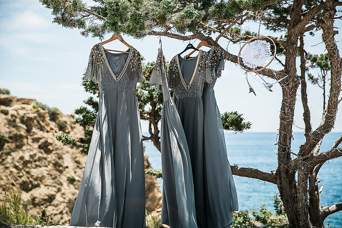 Karen wore an Enzoani gown for her Ibiza destination wedding, her bridesmaids wore Virgos Lounge floor length beaded gowns. Photography by Samie Lee.