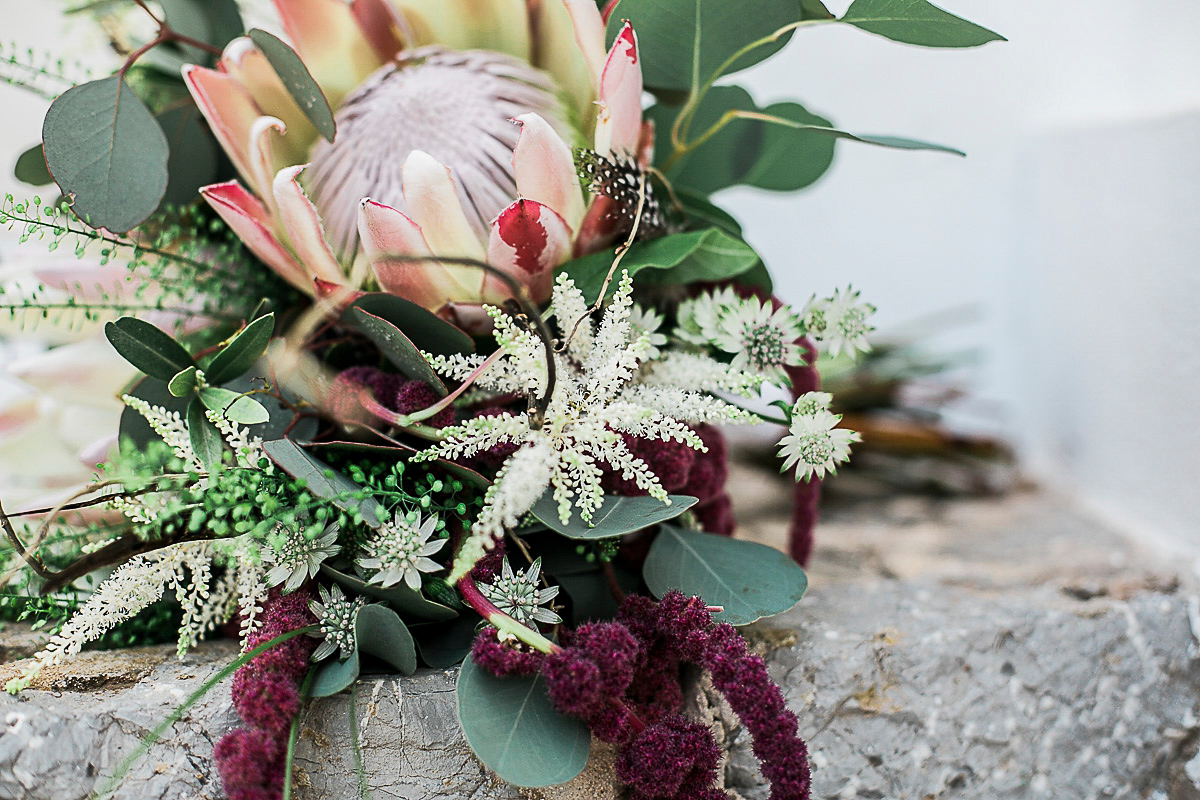 Karen wore an Enzoani gown for her Ibiza destination wedding, her bridesmaids wore Virgos Lounge floor length beaded gowns. Photography by Samie Lee.