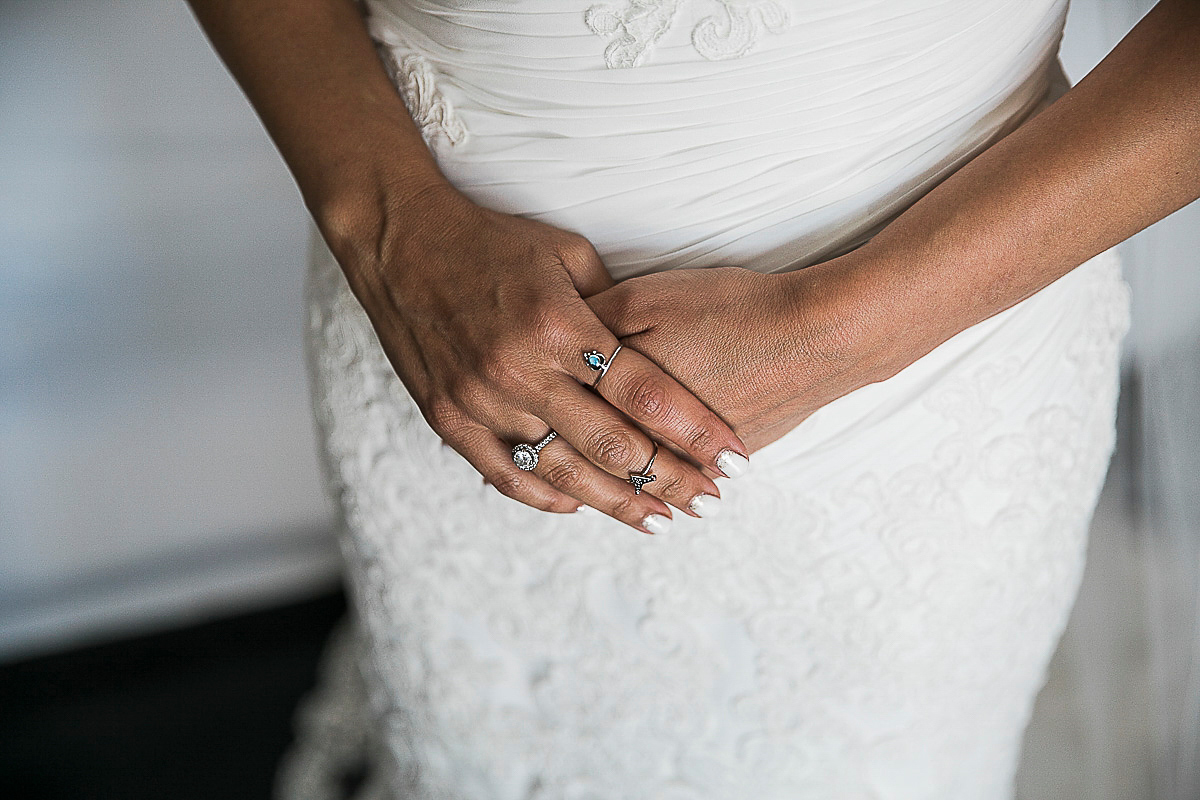 Karen wore an Enzoani gown for her Ibiza destination wedding, her bridesmaids wore Virgos Lounge floor length beaded gowns. Photography by Samie Lee.