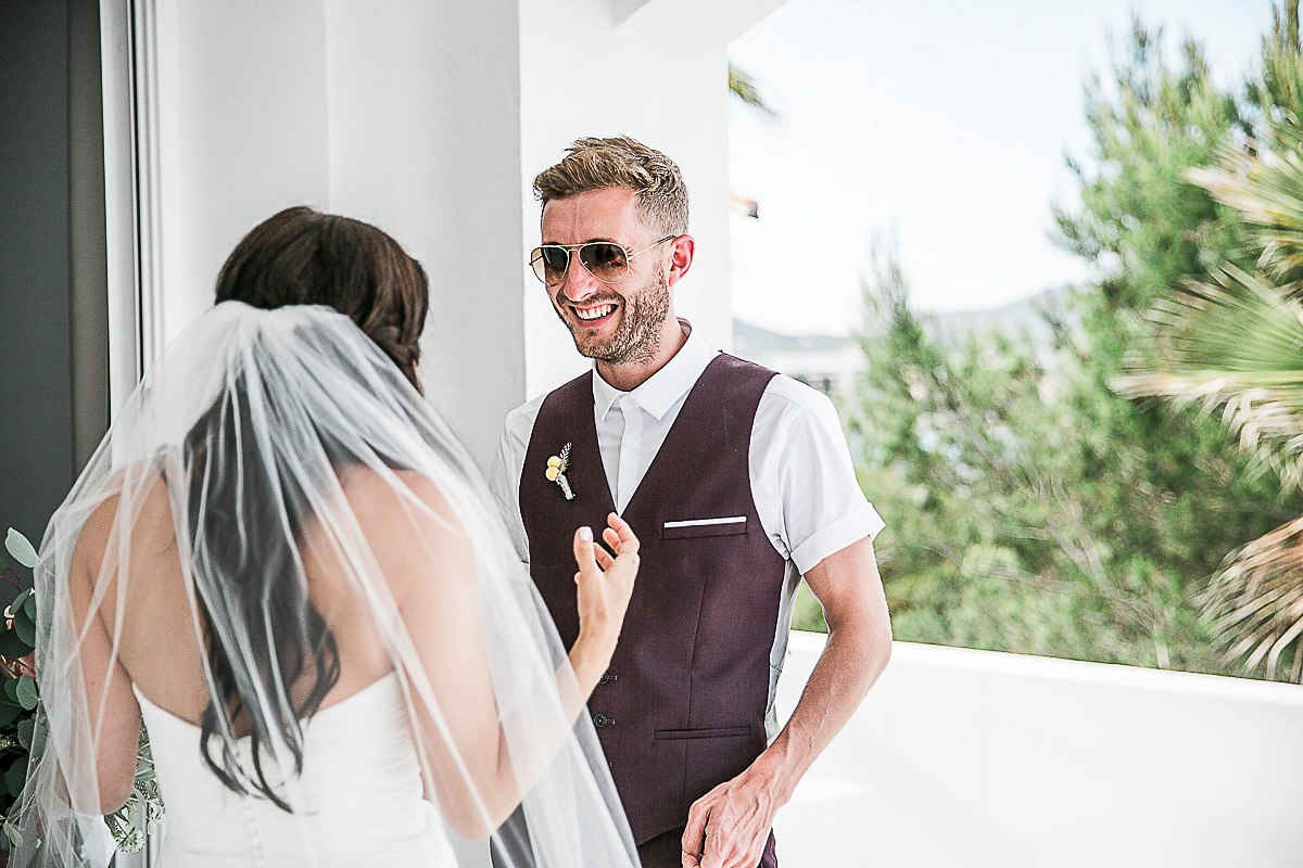 Karen wore an Enzoani gown for her Ibiza destination wedding, her bridesmaids wore Virgos Lounge floor length beaded gowns. Photography by Samie Lee.