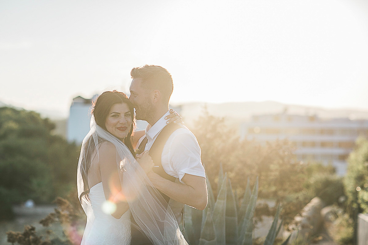 Karen wore an Enzoani gown for her Ibiza destination wedding, her bridesmaids wore Virgos Lounge floor length beaded gowns. Photography by Samie Lee.