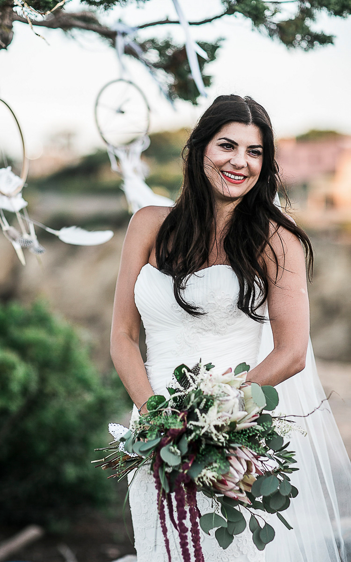 Karen wore an Enzoani gown for her Ibiza destination wedding, her bridesmaids wore Virgos Lounge floor length beaded gowns. Photography by Samie Lee.