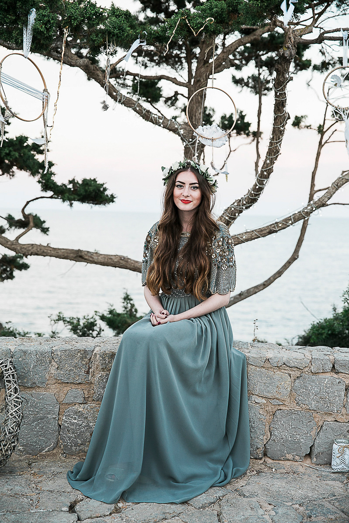 Karen wore an Enzoani gown for her Ibiza destination wedding, her bridesmaids wore Virgos Lounge floor length beaded gowns. Photography by Samie Lee.