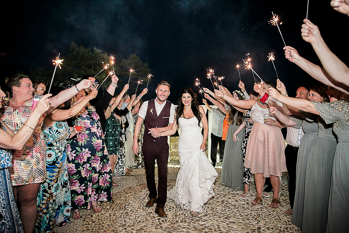 Karen wore an Enzoani gown for her Ibiza destination wedding, her bridesmaids wore Virgos Lounge floor length beaded gowns. Photography by Samie Lee.