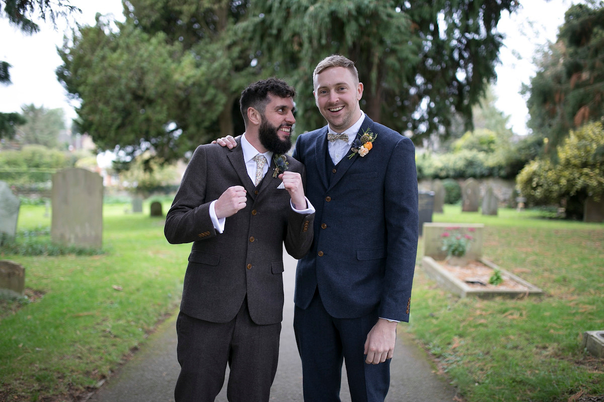 Bride Laura wore a Charlie Brear gown and floral crown for her charming Autumn village hall wedding. Photography by Henry Britten.