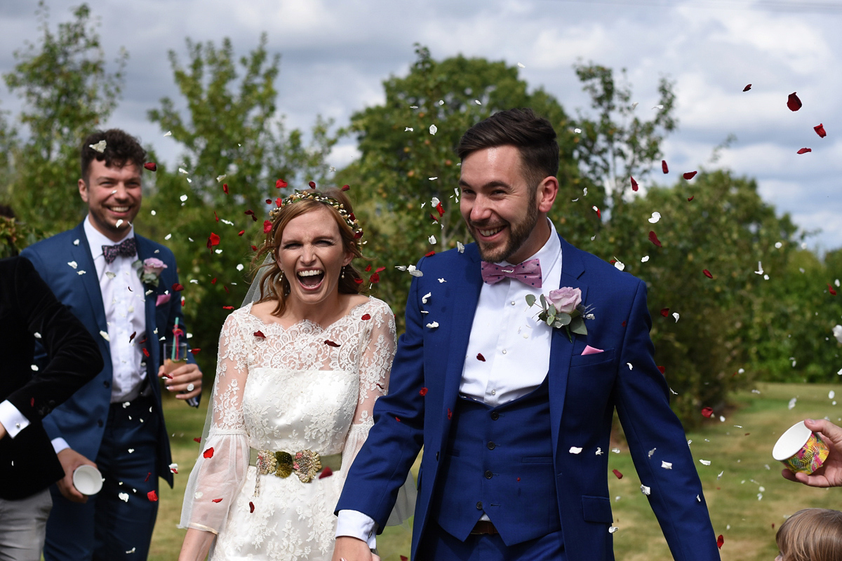 Bride Holly wore the Honor gown by Sally Lacock for her Turkish/Mediterranean and Festival inspired Summer wedding. Photography by Anna Durrant.
