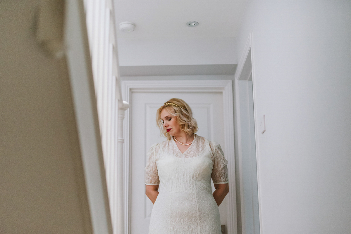 Lovely bride Claire wore a 1930's vintage wedding gown for her eco friendly and ethical wedding in London. Captured by Babb Photography.