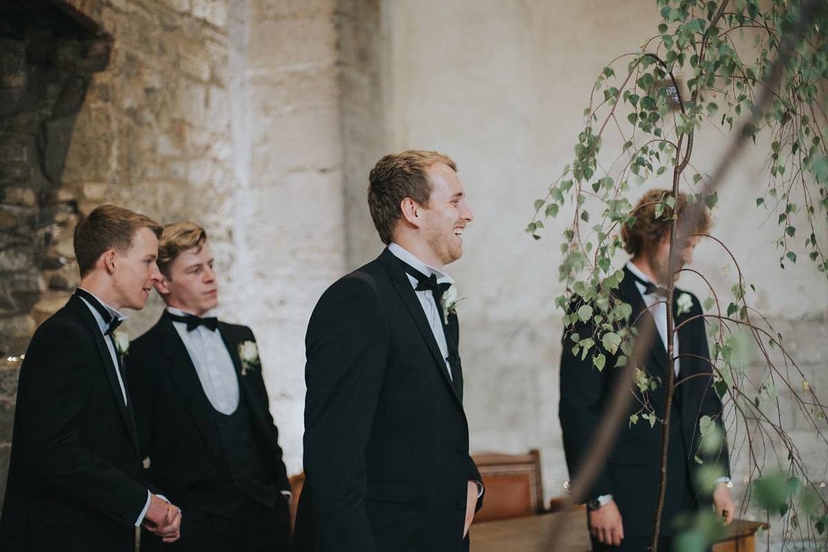 Barefoot bride Zoё wore a dress she had designed herself for her effortlessly elegant wedding at Blackfriar medieval priory in Gloucester. Captured by Grace Elizabeth Photography.