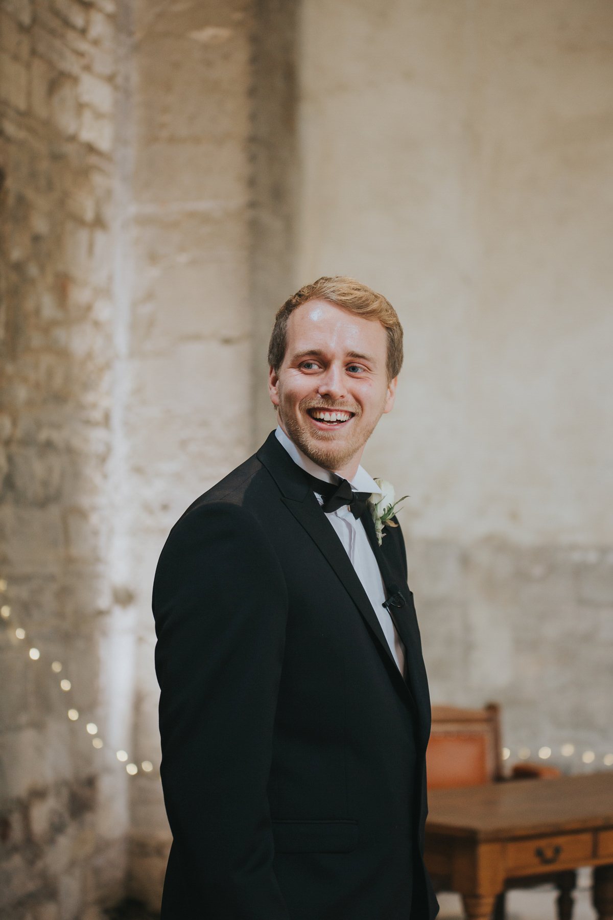 Barefoot bride Zoё wore a dress she had designed herself for her effortlessly elegant wedding at Blackfriar medieval priory in Gloucester. Captured by Grace Elizabeth Photography.