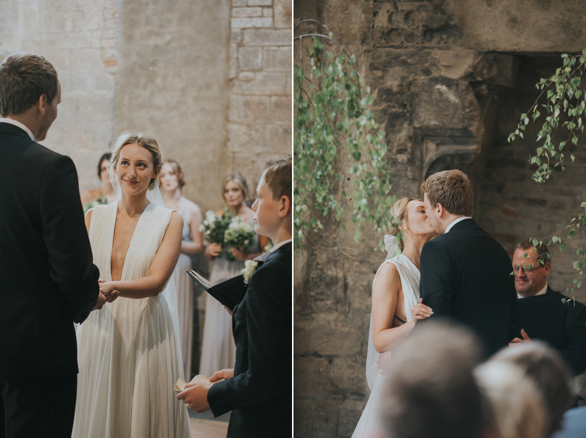 Barefoot bride Zoё wore a dress she had designed herself for her effortlessly elegant wedding at Blackfriar medieval priory in Gloucester. Captured by Grace Elizabeth Photography.