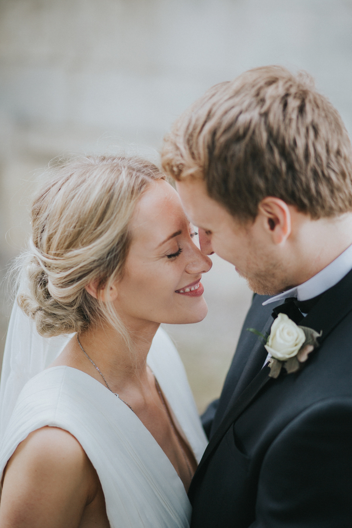 Barefoot bride Zoё wore a dress she had designed herself for her effortlessly elegant wedding at Blackfriar medieval priory in Gloucester. Captured by Grace Elizabeth Photography.