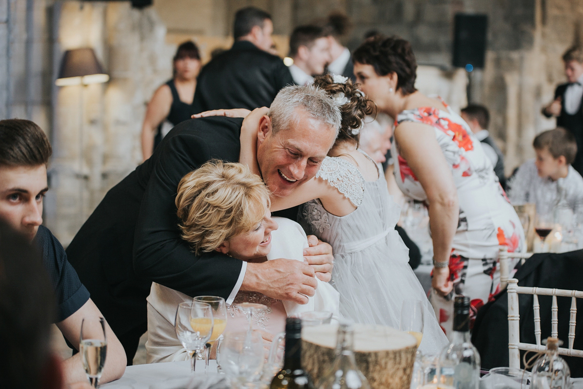 Barefoot bride Zoё wore a dress she had designed herself for her effortlessly elegant wedding at Blackfriar medieval priory in Gloucester. Captured by Grace Elizabeth Photography.