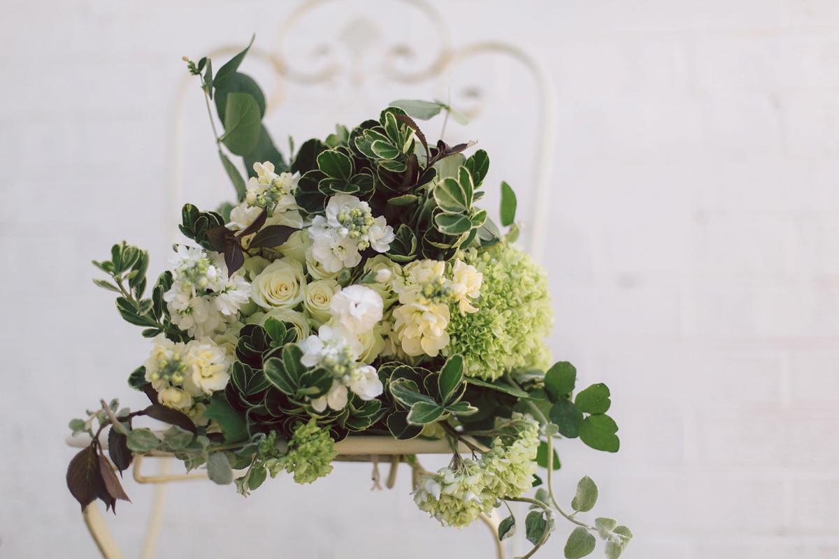 Barefoot bride Zoё wore a dress she had designed herself for her effortlessly elegant wedding at Blackfriar medieval priory in Gloucester. Captured by Grace Elizabeth Photography.