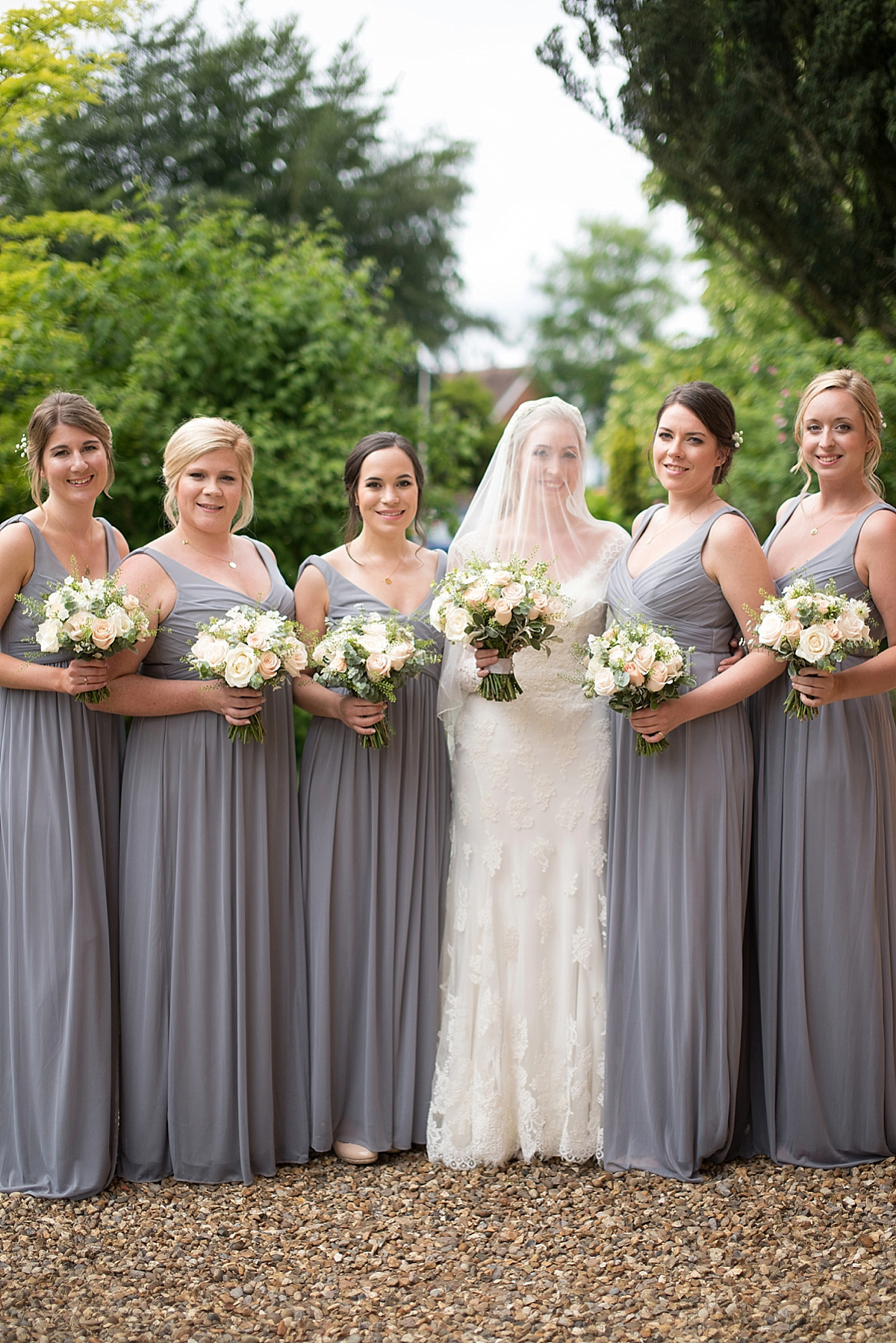 Wedding stationery and illusrator Isabel of Bel & Bee wore an Essense of Australia gown for her English country wedding full of charm. Images by Faye Cornhill.