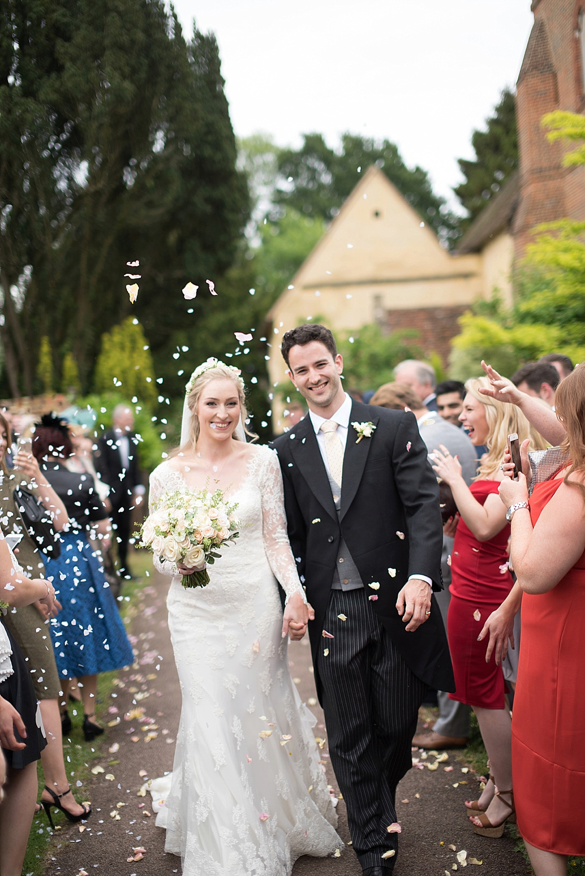 Wedding stationery and illusrator Isabel of Bel & Bee wore an Essense of Australia gown for her English country wedding full of charm. Images by Faye Cornhill.