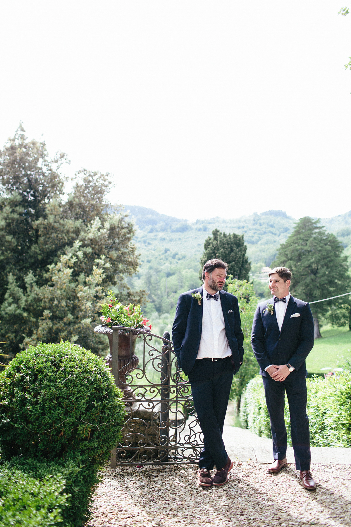 Bride Lucy wore a gold floral Vera Wang gown for her romantic outdoor wedding in the Italian countryside. Images captured by Claudia Rose Carter.