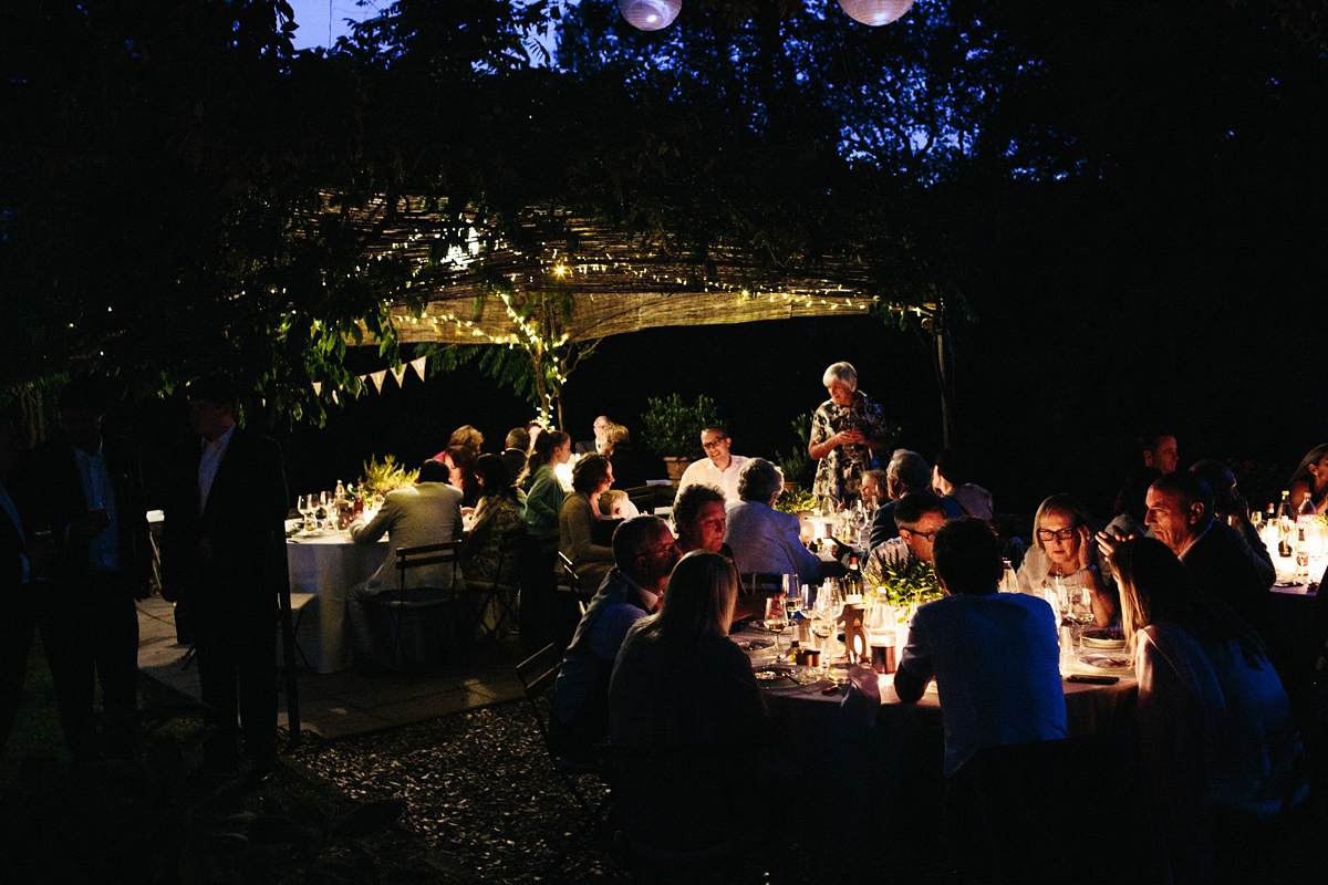 Bride Lucy wore a gold floral Vera Wang gown for her romantic outdoor wedding in the Italian countryside. Images captured by Claudia Rose Carter.