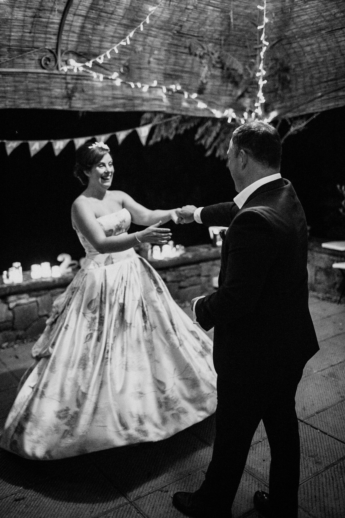 Bride Lucy wore a gold floral Vera Wang gown for her romantic outdoor wedding in the Italian countryside. Images captured by Claudia Rose Carter.