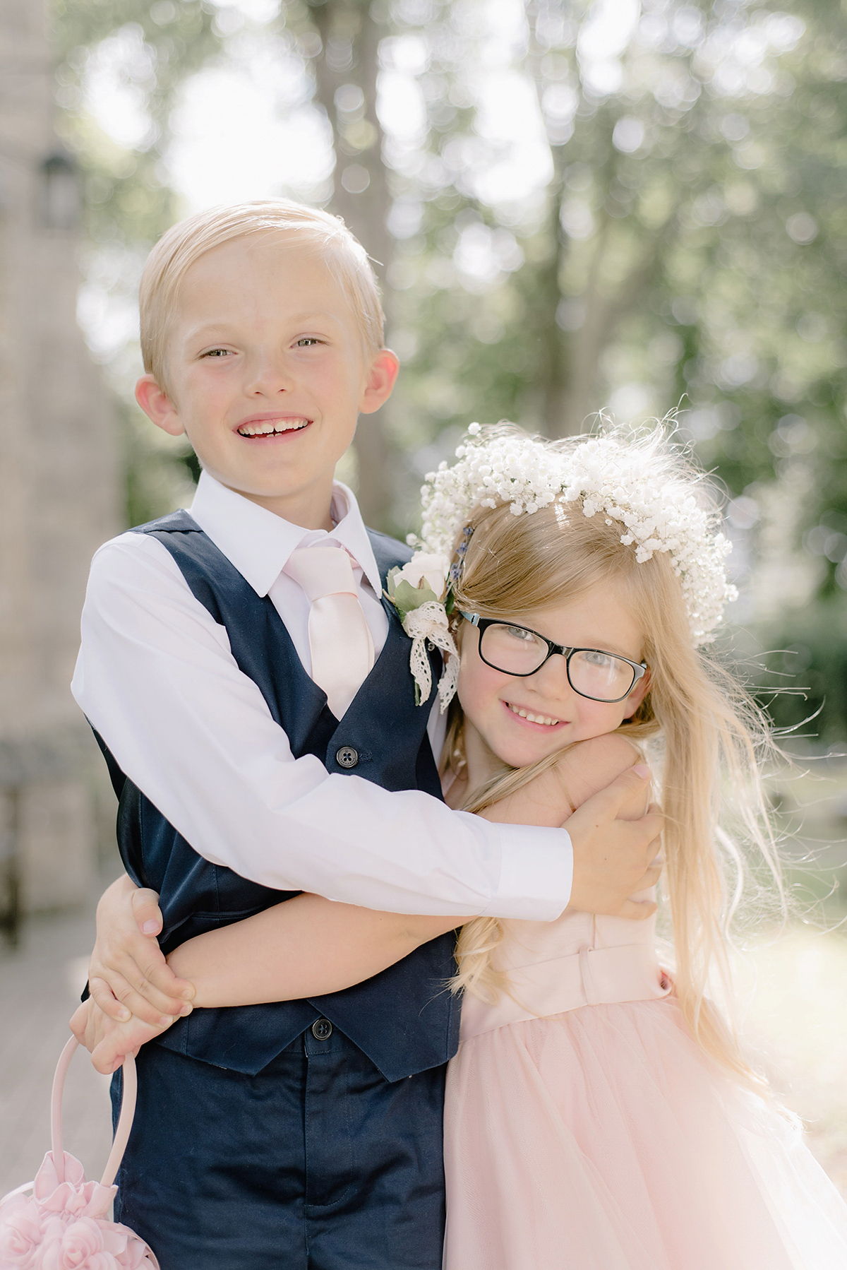 Dani wore a Justin Alexander gown for her relaxed and romantic English country wedding. Fine art film photography by Georgina Harrison.