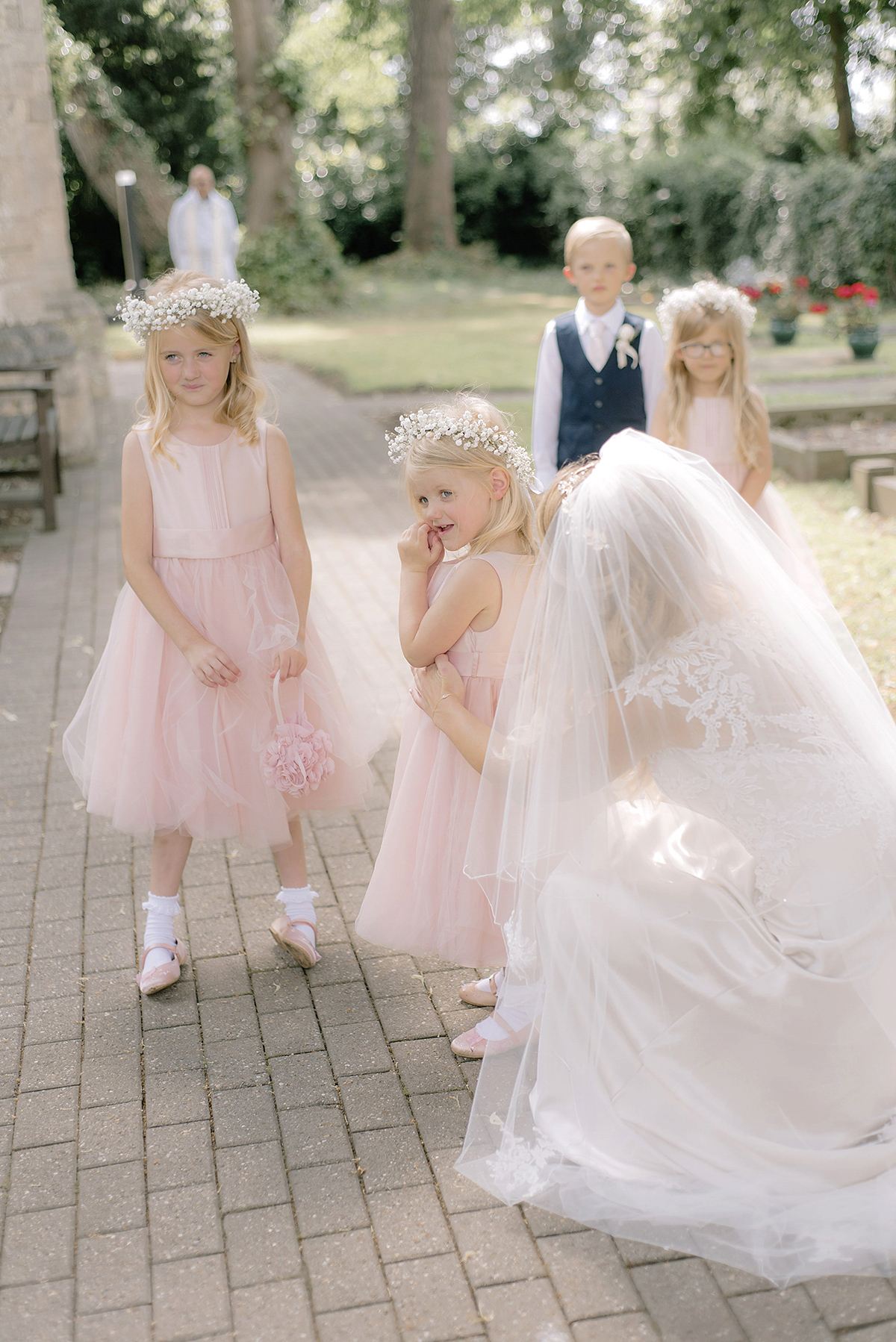 Dani wore a Justin Alexander gown for her relaxed and romantic English country wedding. Fine art film photography by Georgina Harrison.