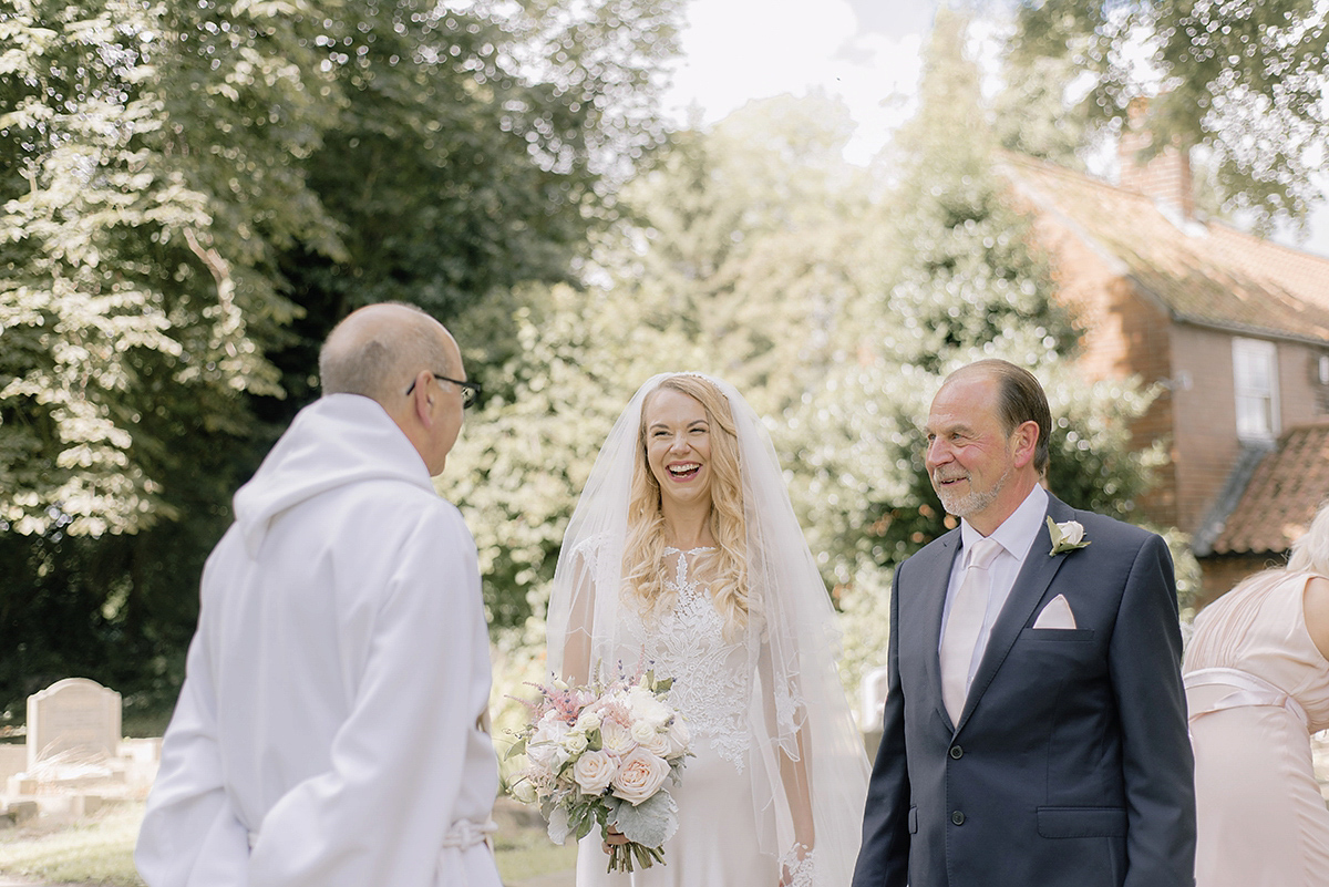 Dani wore a Justin Alexander gown for her relaxed and romantic English country wedding. Fine art film photography by Georgina Harrison.