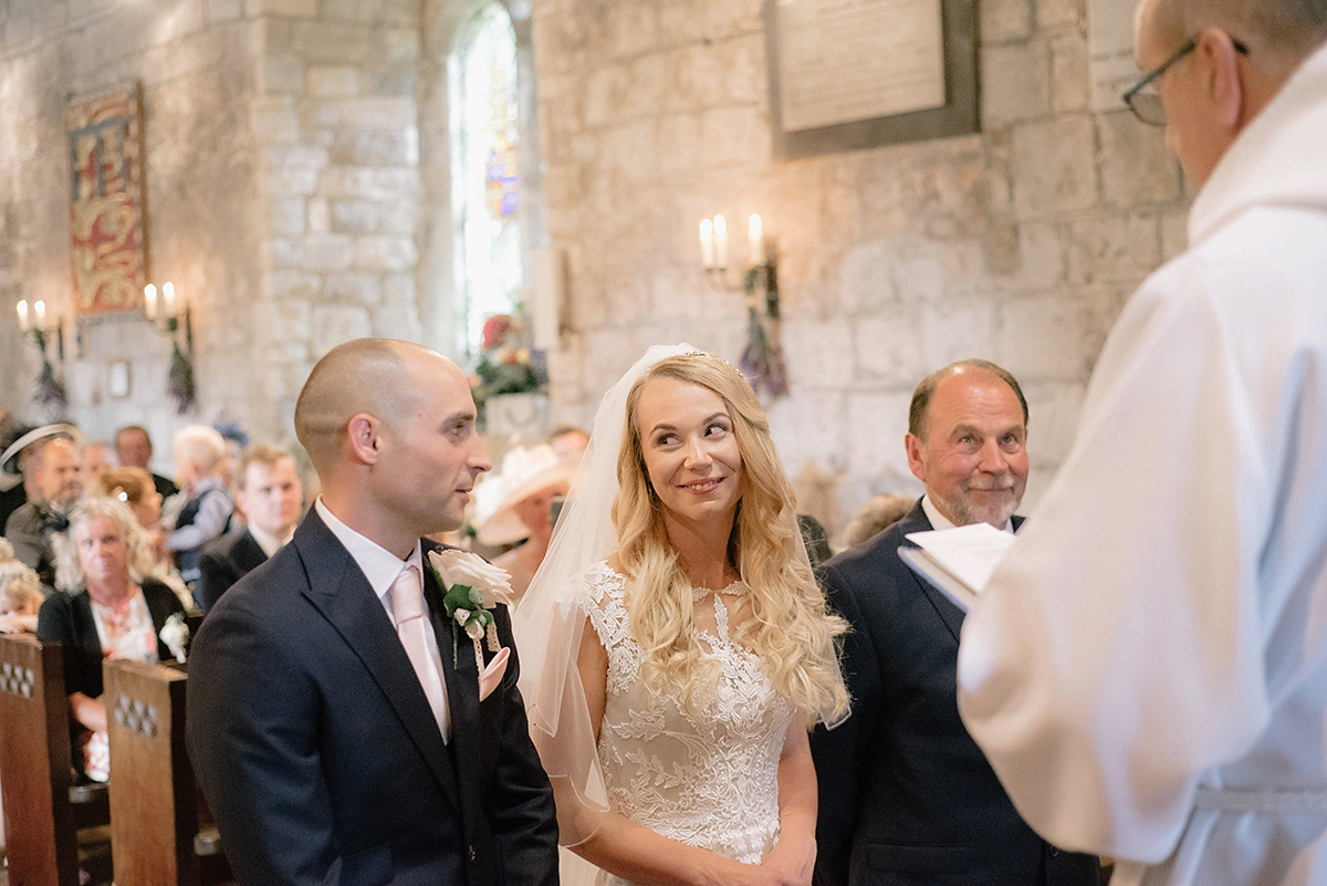 Dani wore a Justin Alexander gown for her relaxed and romantic English country wedding. Fine art film photography by Georgina Harrison.