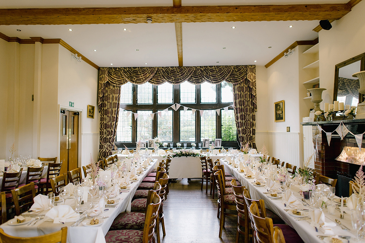 Dani wore a Justin Alexander gown for her relaxed and romantic English country wedding. Fine art film photography by Georgina Harrison.