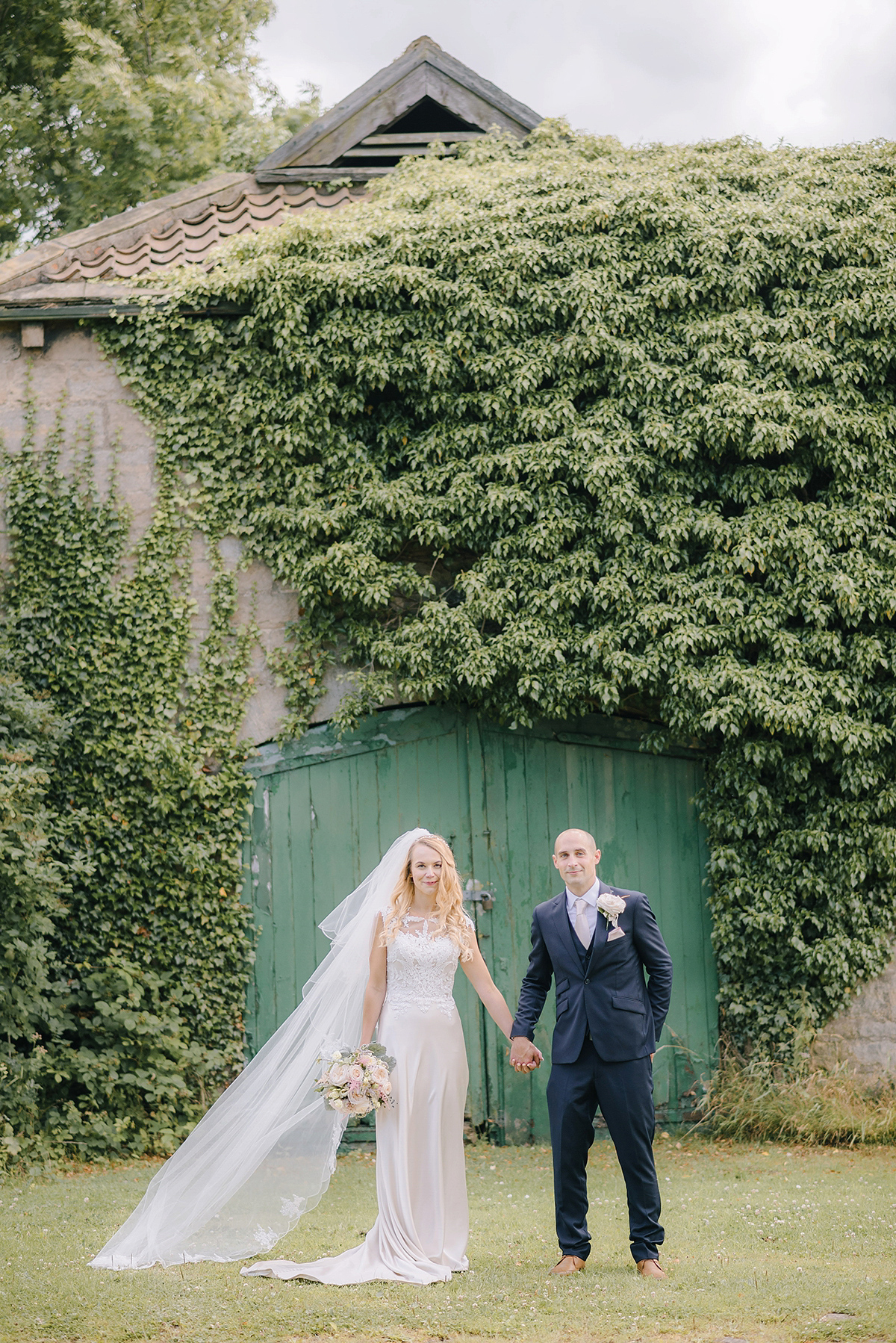 Dani wore a Justin Alexander gown for her relaxed and romantic English country wedding. Fine art film photography by Georgina Harrison.