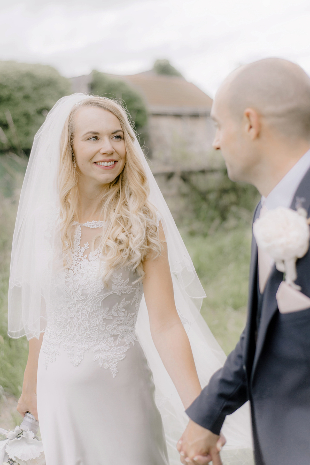 Dani wore a Justin Alexander gown for her relaxed and romantic English country wedding. Fine art film photography by Georgina Harrison.