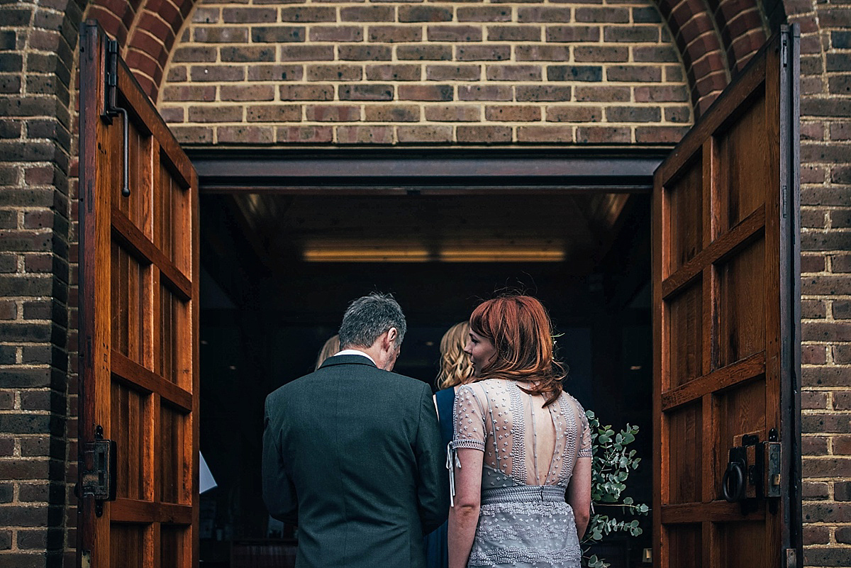 Bride Amelia wore a pale blue/grey Self Portrait dress for her handmade and stripped back, non traditional wedding. Captured by Three Flowers Photography.