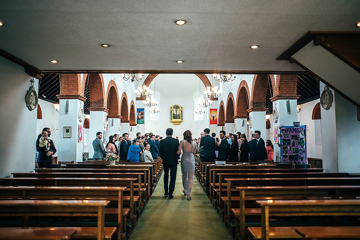 Bride Amelia wore a pale blue/grey Self Portrait dress for her handmade and stripped back, non traditional wedding. Captured by Three Flowers Photography.
