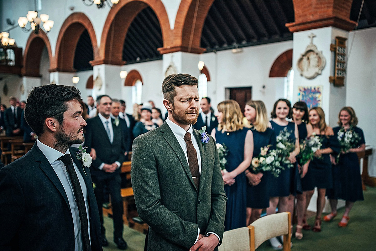 Bride Amelia wore a pale blue/grey Self Portrait dress for her handmade and stripped back, non traditional wedding. Captured by Three Flowers Photography.