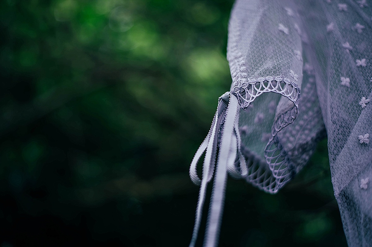 Bride Amelia wore a pale blue/grey Self Portrait dress for her handmade and stripped back, non traditional wedding. Captured by Three Flowers Photography.