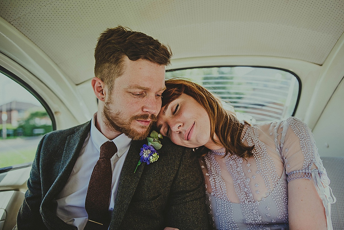 Bride Amelia wore a pale blue/grey Self Portrait dress for her handmade and stripped back, non traditional wedding. Captured by Three Flowers Photography.