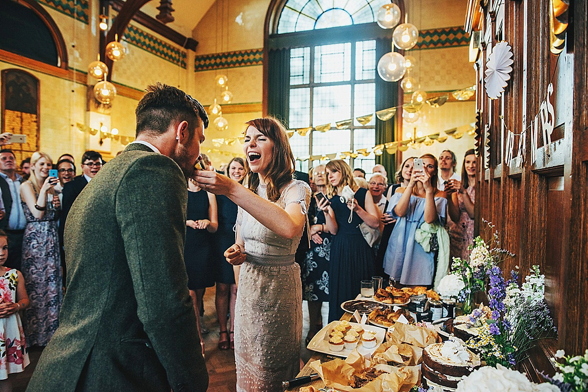 Bride Amelia wore a pale blue/grey Self Portrait dress for her handmade and stripped back, non traditional wedding. Captured by Three Flowers Photography.