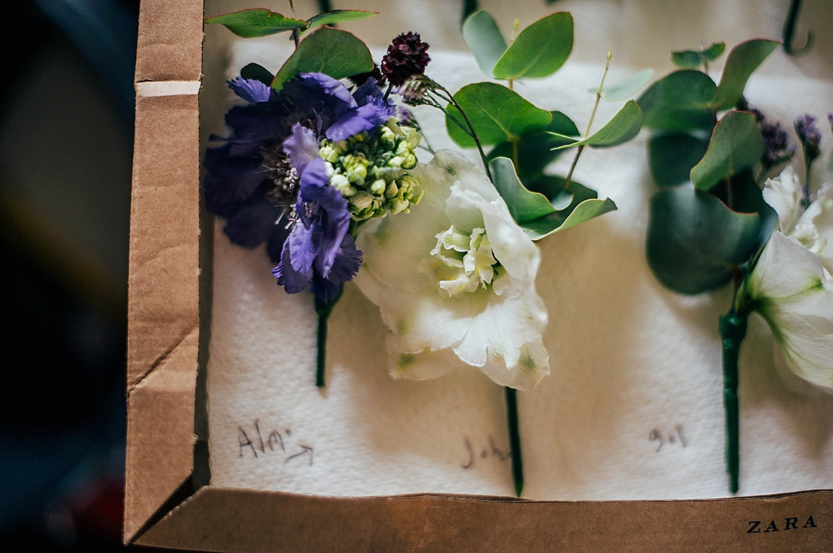 Bride Amelia wore a pale blue/grey Self Portrait dress for her handmade and stripped back, non traditional wedding. Captured by Three Flowers Photography.