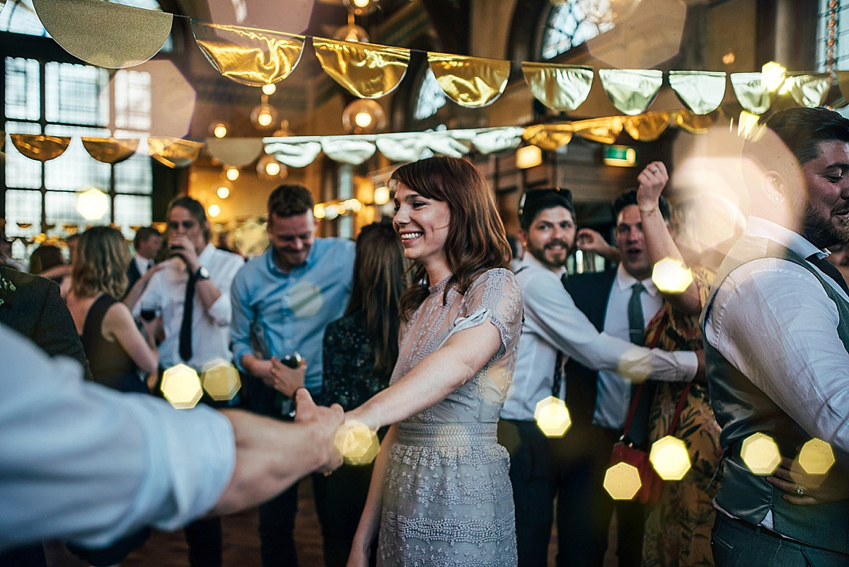 Bride Amelia wore a pale blue/grey Self Portrait dress for her handmade and stripped back, non traditional wedding. Captured by Three Flowers Photography.