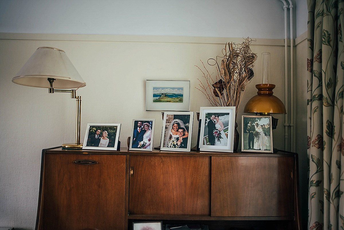 Bride Amelia wore a pale blue/grey Self Portrait dress for her handmade and stripped back, non traditional wedding. Captured by Three Flowers Photography.