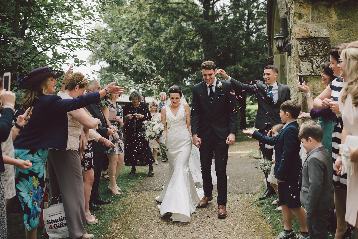 Bride Nina wore a Sincerity gown for her rustic and handmade Spring country barn wedding. Photography by Roberta Matis. Bride Nina wore a Sincerity gown for her rustic and handmade Spring country barn wedding. Photography by Roberta Matis.