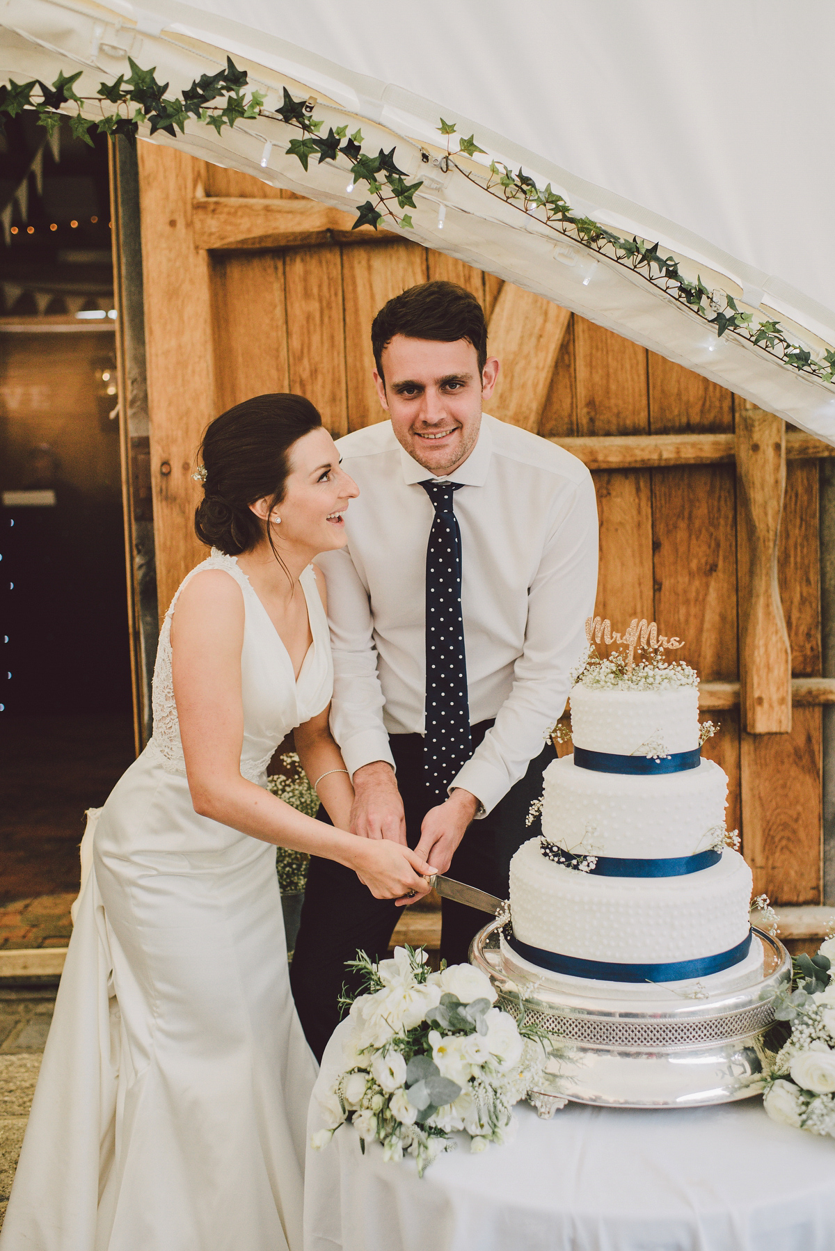 Bride Nina wore a Sincerity gown for her rustic and handmade Spring country barn wedding. Photography by Roberta Matis. Bride Nina wore a Sincerity gown for her rustic and handmade Spring country barn wedding. Photography by Roberta Matis.