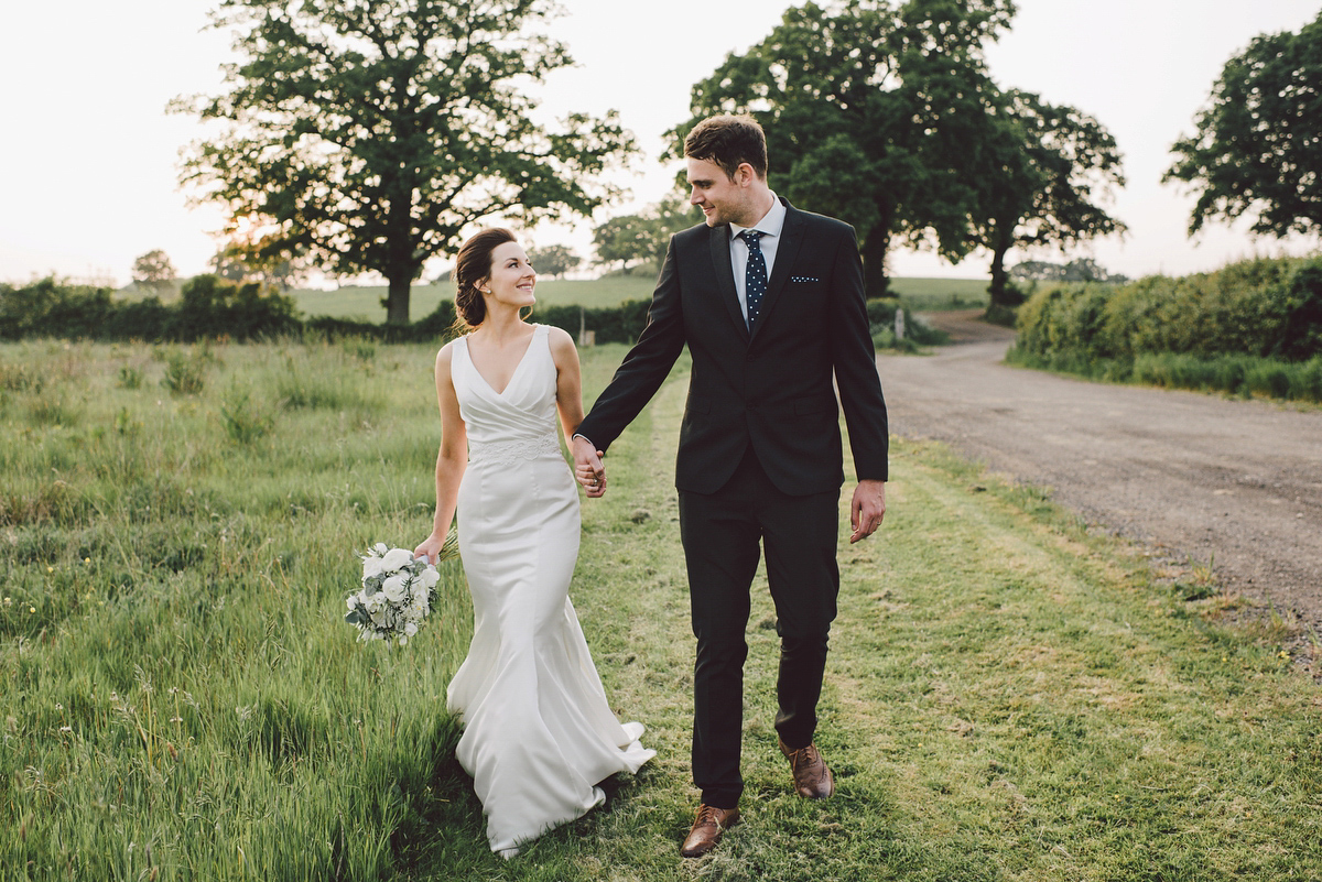Bride Nina wore a Sincerity gown for her rustic and handmade Spring country barn wedding. Photography by Roberta Matis. Bride Nina wore a Sincerity gown for her rustic and handmade Spring country barn wedding. Photography by Roberta Matis.